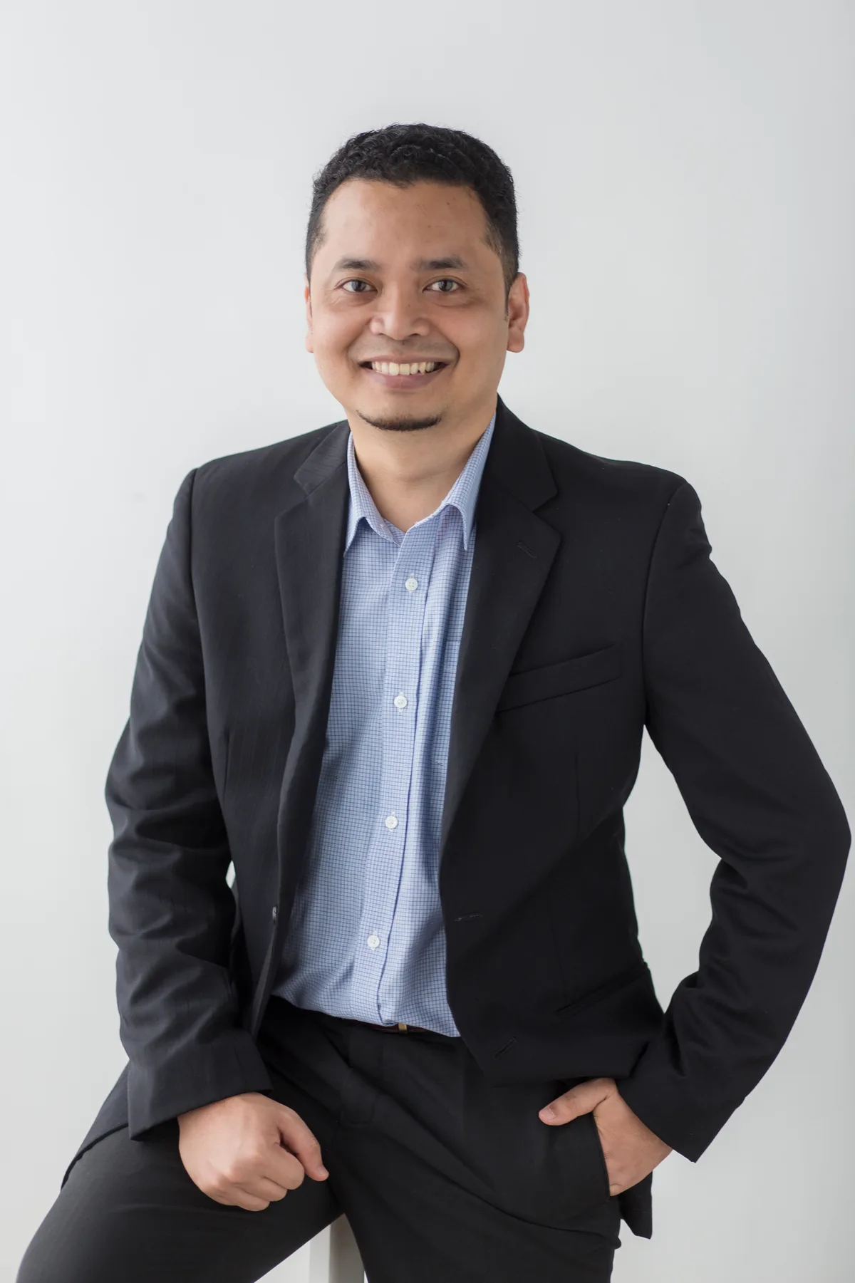Hasan Amini, perancang kewangan berlesen